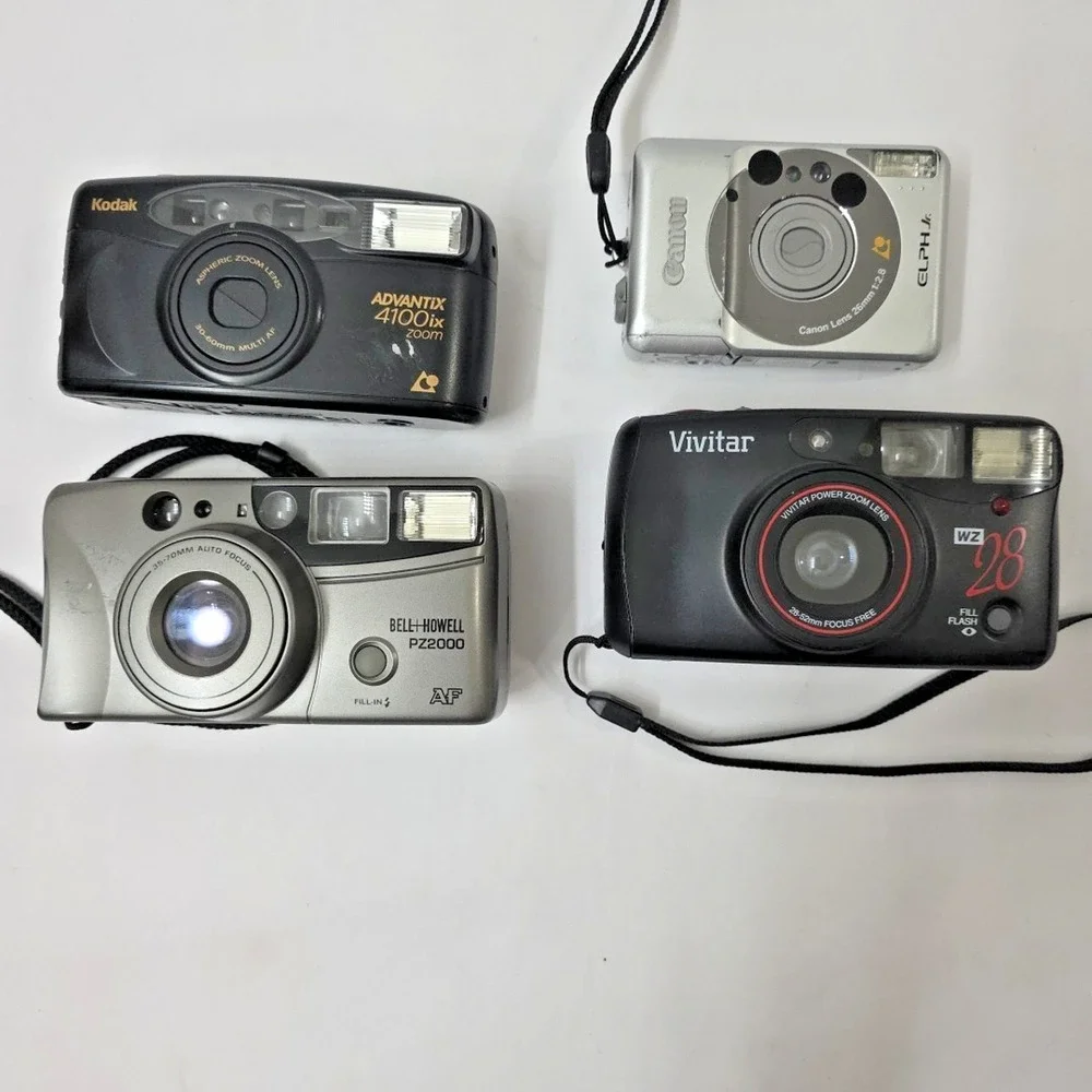 Lot of 4 Film Cameras, Kodak, Canon, Bell Howell, Vivitar Not Film Tested Read